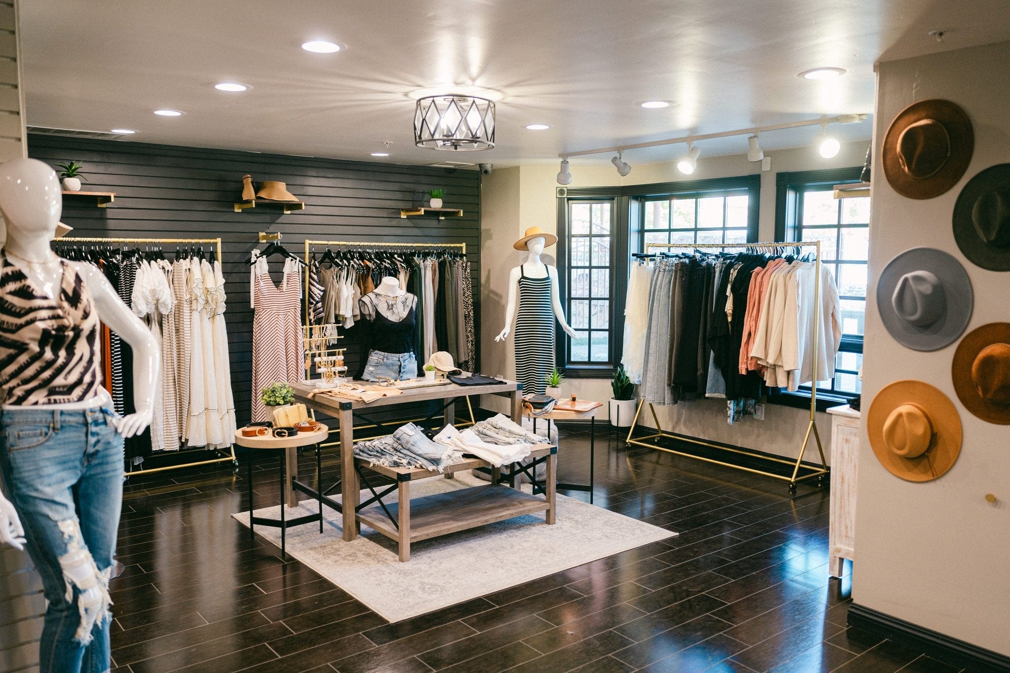 Curated clothing racks inside the Salon on 3rd boutique